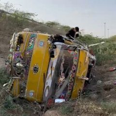 coaster plunges into ditch on karachis super highway